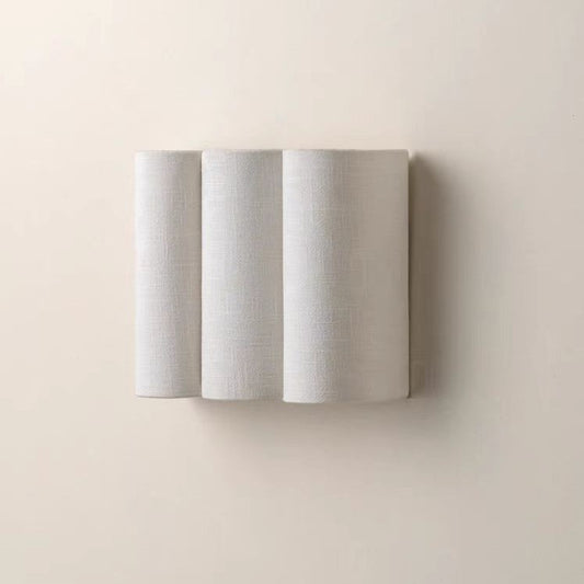 Mid century wall sconce fabric wave bedroom headboard neutral